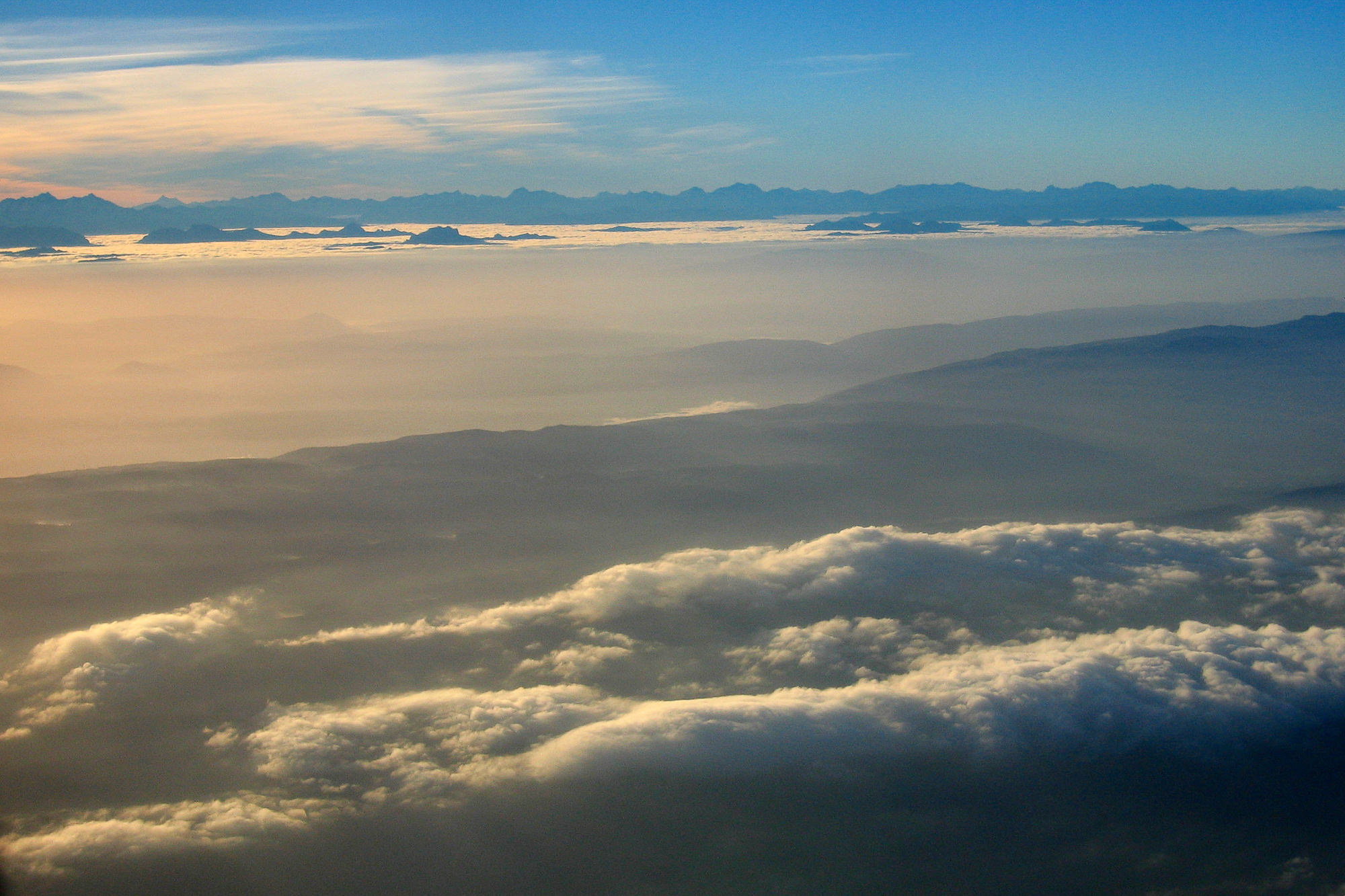 Arrival, flight along the Alps